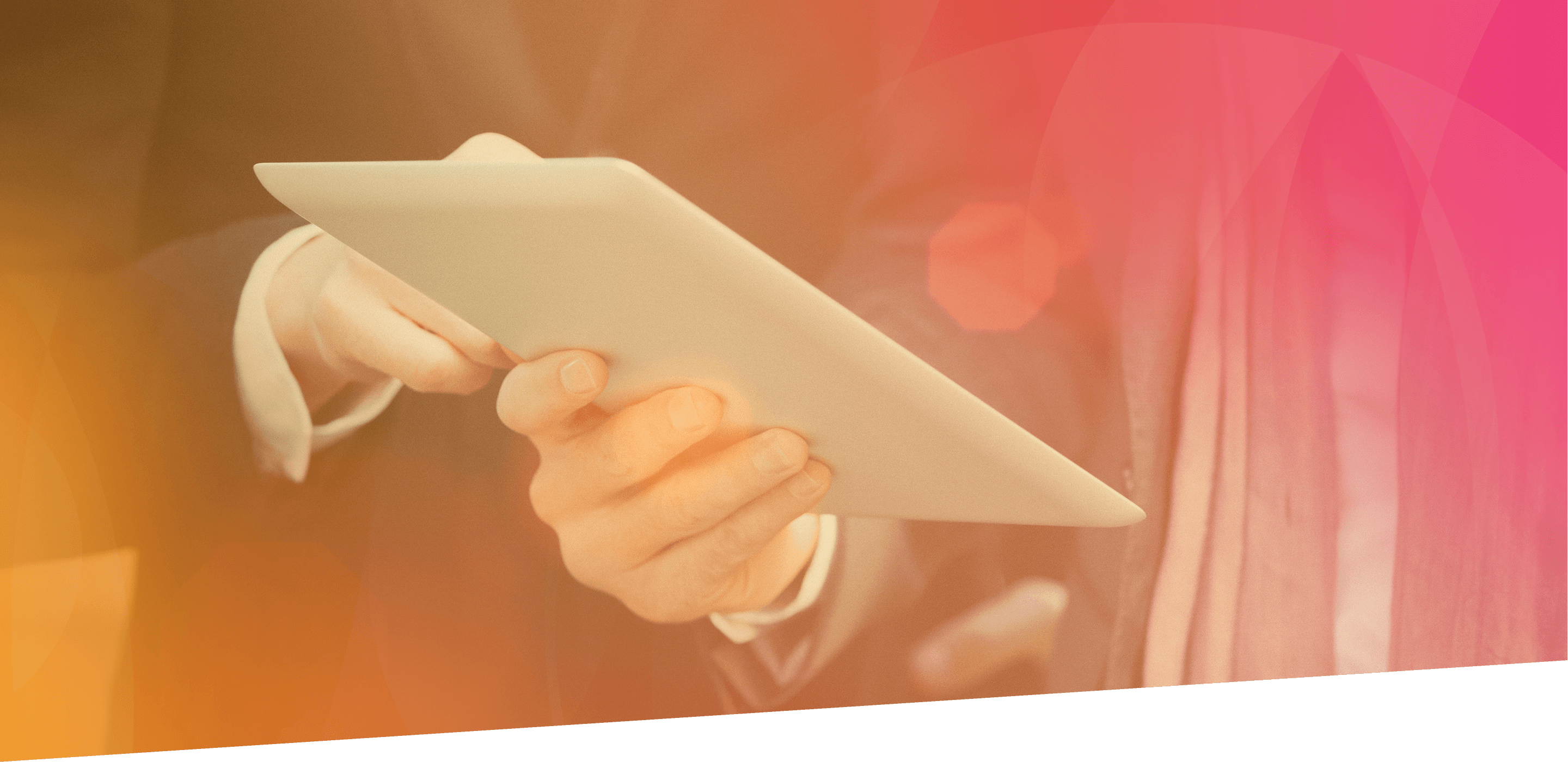 two people look at a tablet screen together
